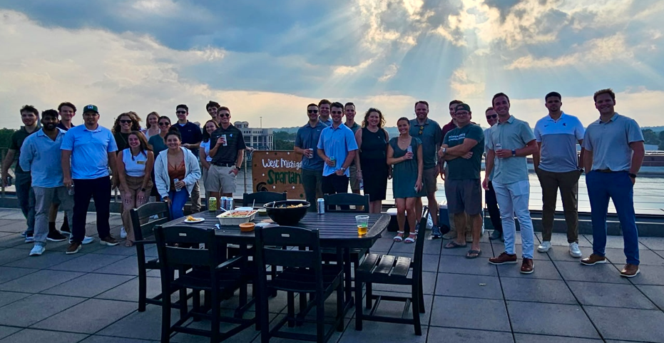 West Michigan Spartans Young Alumni at rooftop happy hour